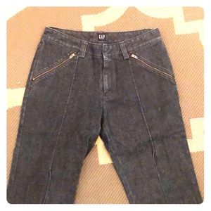 Denim trousers with zipper pockets